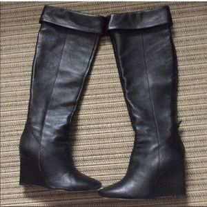 Over the knee black leather boots